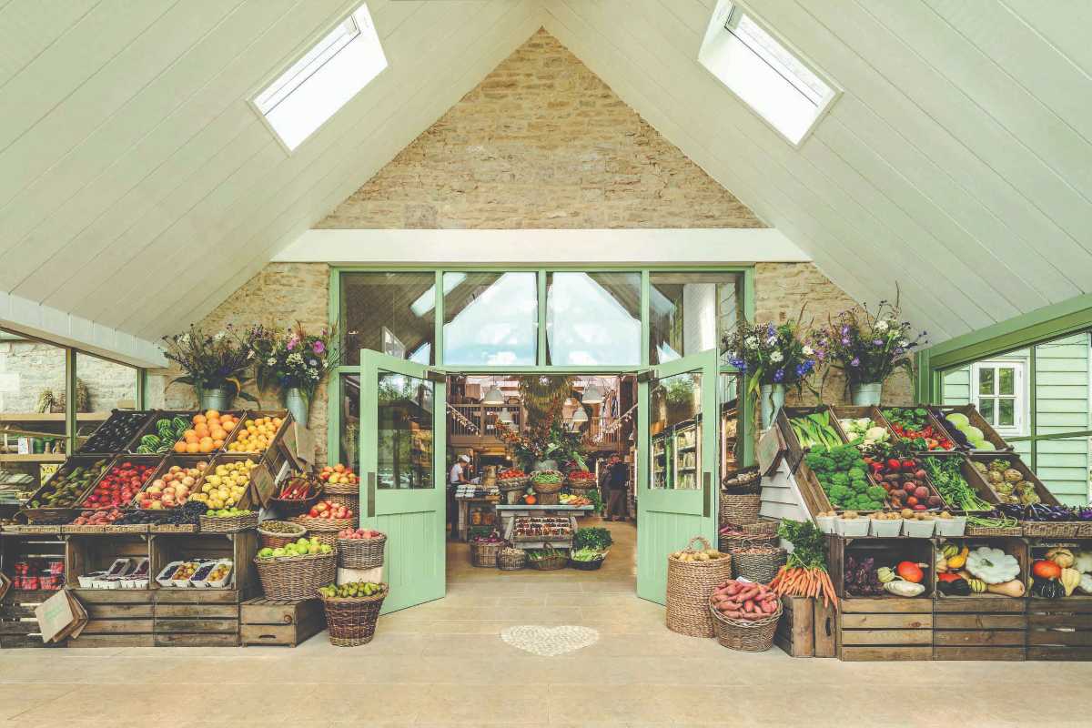 General news article image showing diverse group of professionals in a modern office setting collaborating on a project.